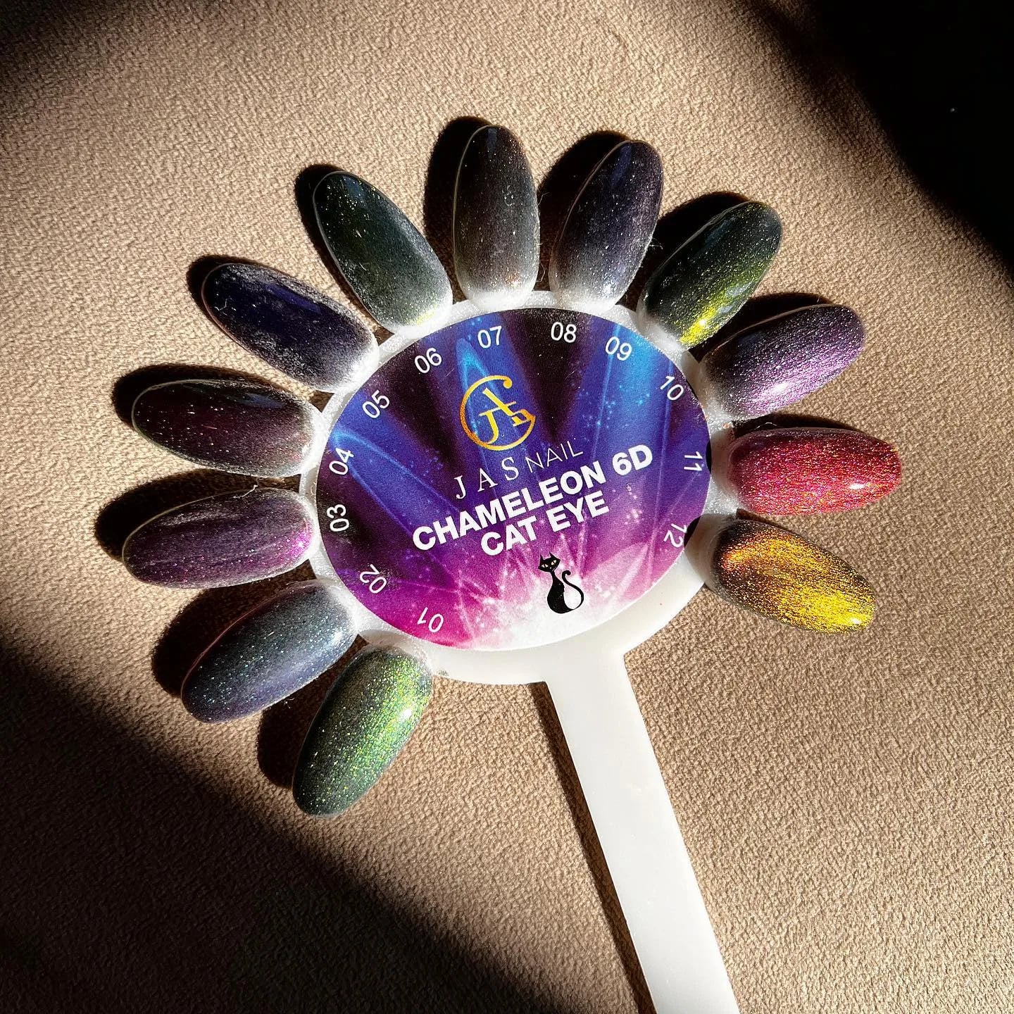 Cat eye gel swatches on a display wheel