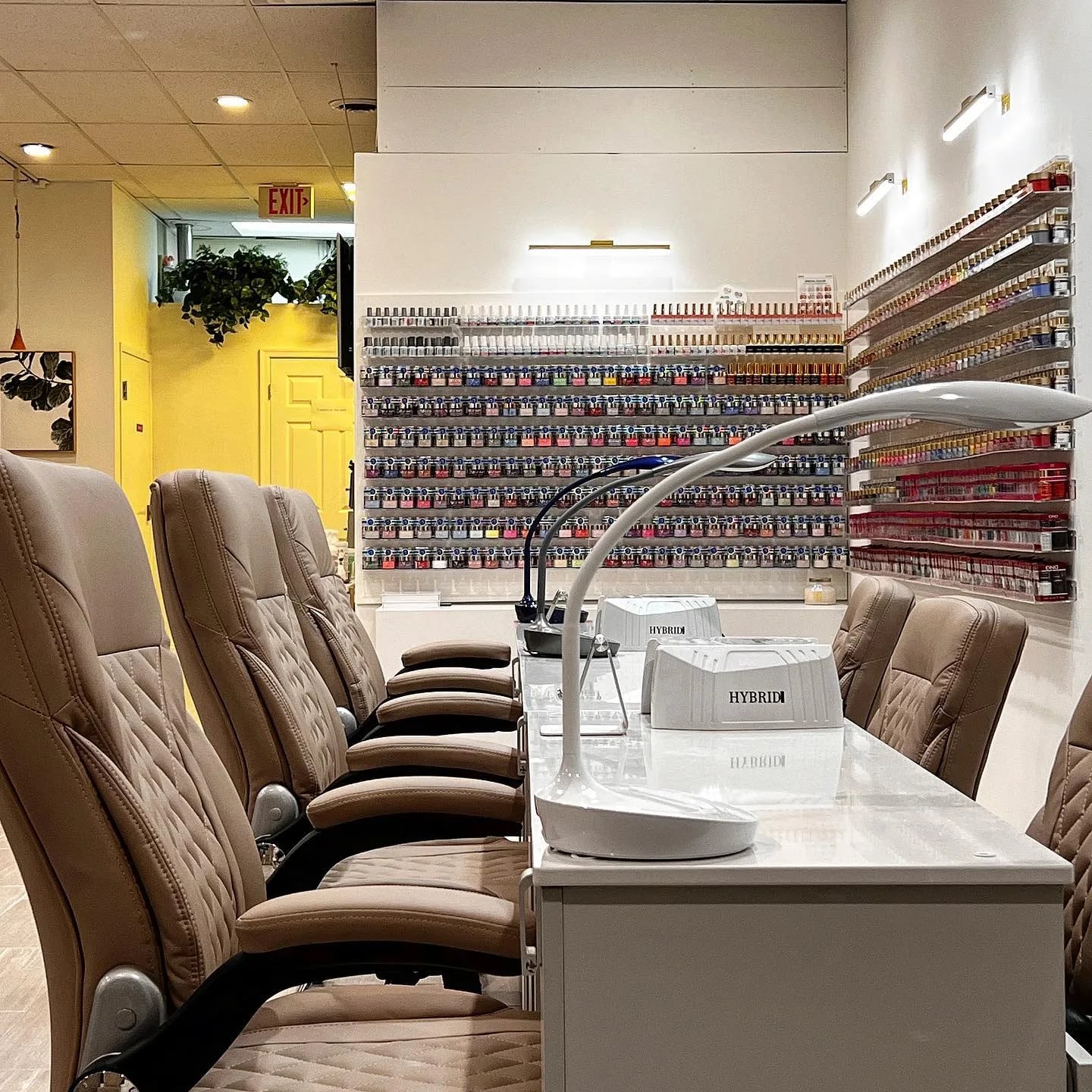 The salon floor with the polish walls and pedicure chairs